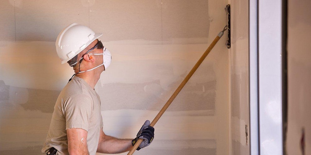 Drywall installation crew at work