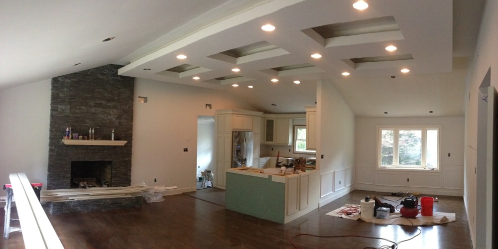 Open concept home renovation with coffered ceiling