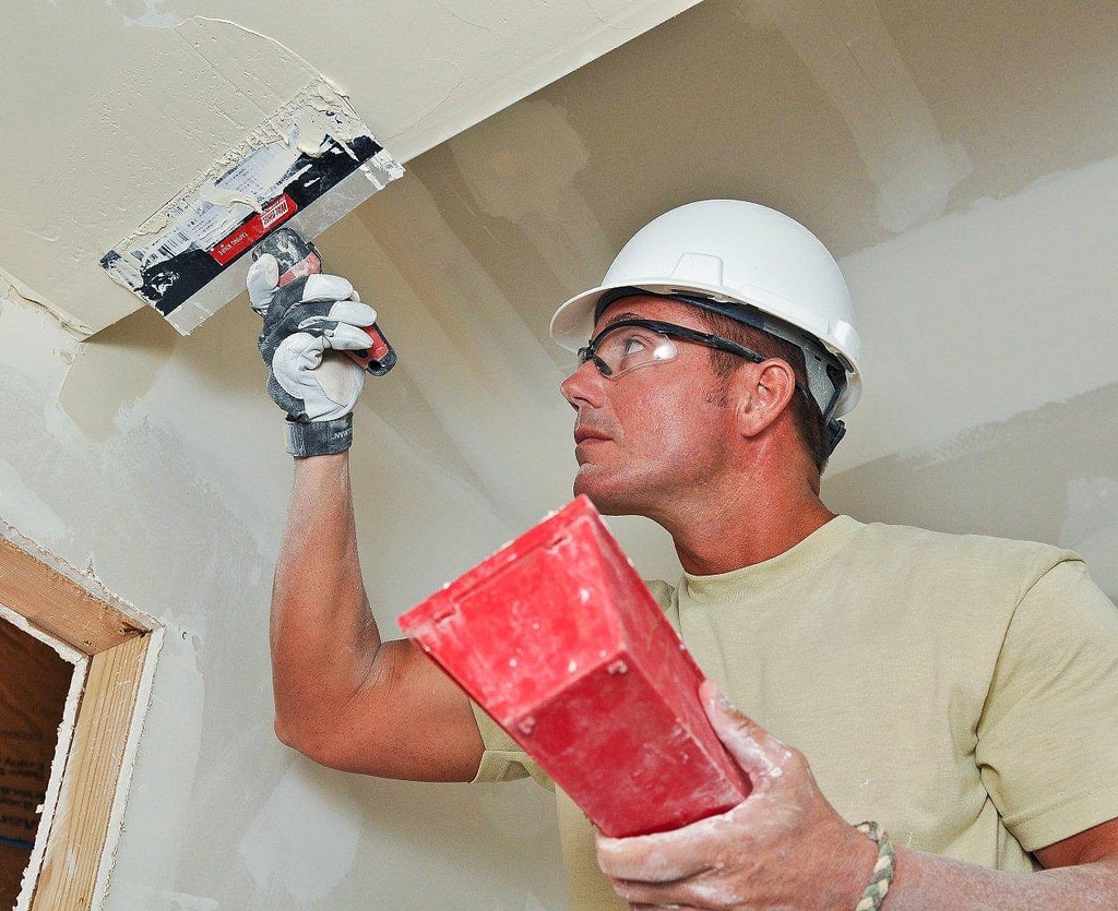 Residential drywall worker on site