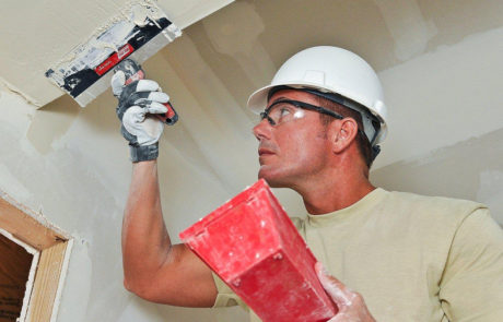 Fogg Bros. drywall worker on the job